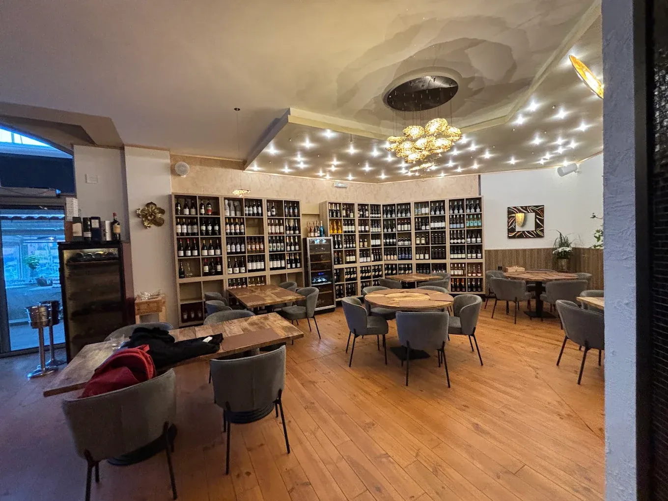 Floor-to-ceiling wine shelves in the dining room at Sotogrande