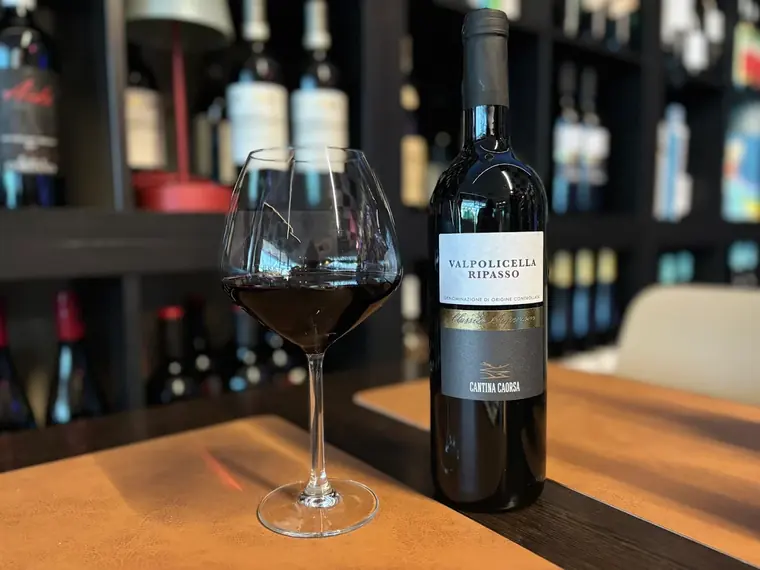A glass and bottle of Valpolicella Ripasso